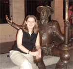 Leslie Maxwell Kaiura with statue.