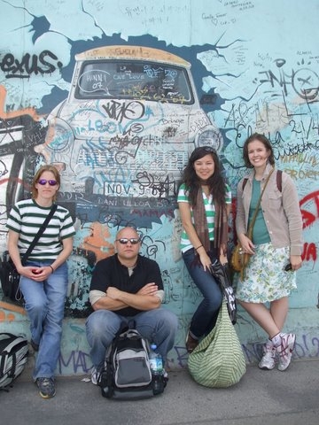 Global Studies students in front of graffiti-ed wall in Berlin