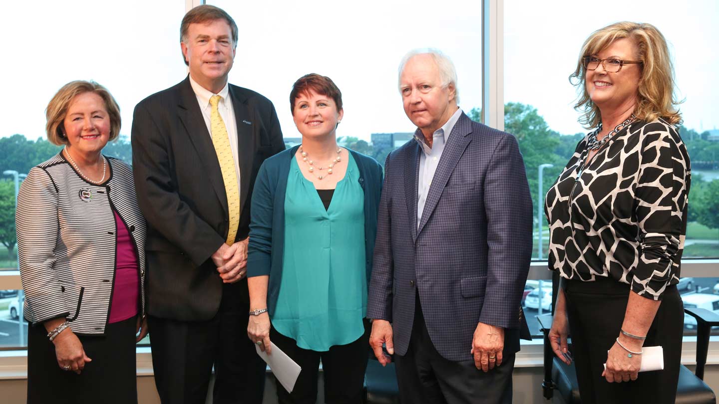 Judy Ryals of the Huntsville/Madison County Convention & Visitor's Bureau, Huntsville Mayor Tommy Battle, CRP Director Erin Koshut, UAH President Robert Altenkirch, and Vickie Palmer, Director of Operations for the Association of University Research Parks.
