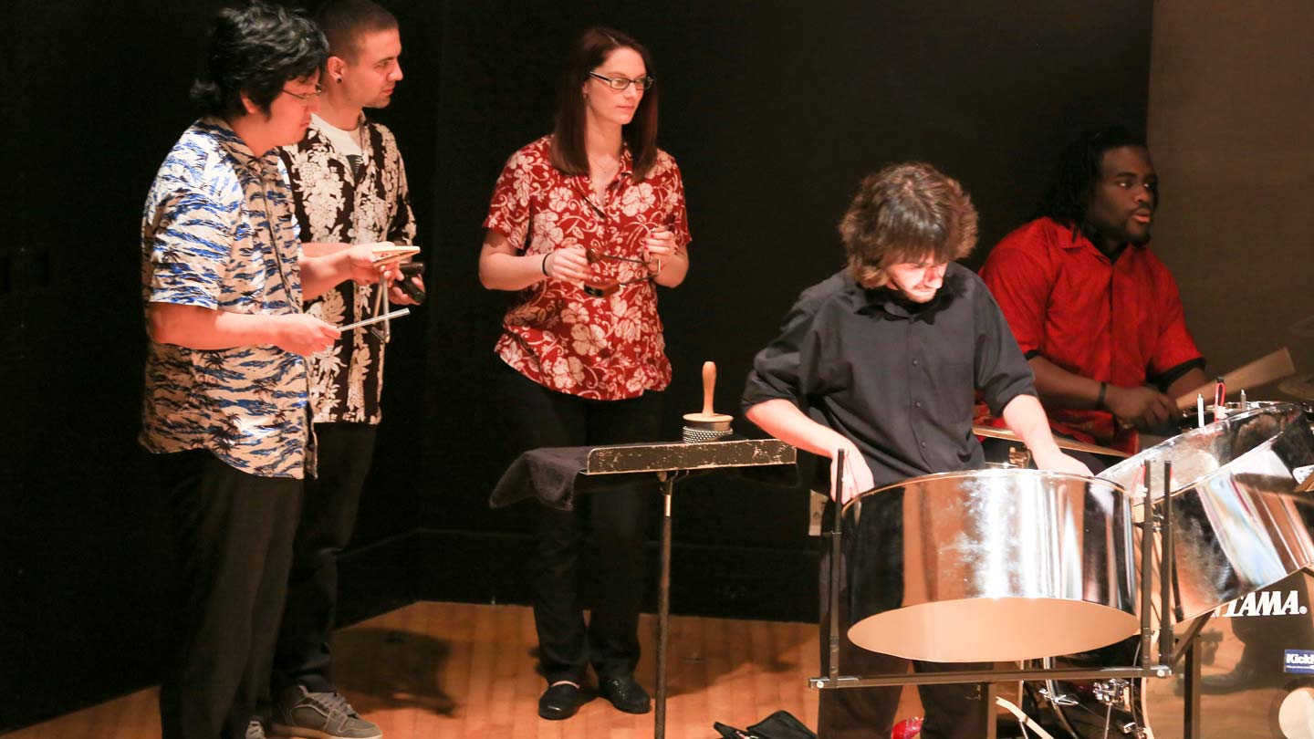 Members of the UAH steel drum band perform island classics