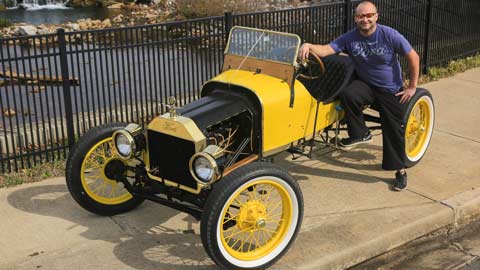 Seth Spratlin beside his 1914 Model T Ford