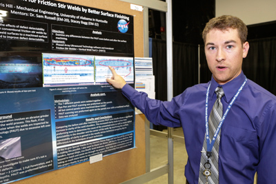 UAH students who graduated from the Marshall Space Flight Center’s summer internship program presented their project posters and abstracts on Wednesday, Aug. 9. From top are Jaewon Choi, physics, mathematics, optics; Chris Hill, mechanical engineering; Markus Murdy, aerospace engineering; Glenn Scott Nesbitt II, aerospace engineering; and Maria Emma Torres, chemistry/biology.