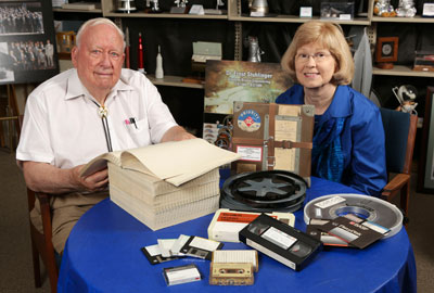 Dr. Charles Lundquist, director of Interactive Projects at the UAH Research Center, and Anne Coleman, reference librarian and head of Archives and Special Collections, with obsolete media containing data from the U.S. space program. The IBM printout that Dr. Lundquist is reading is the only surviving copy of the telemetry he needed for research from NASA’s Gravity Probe A mission. The original tape from the 1976 flight is no longer readable.