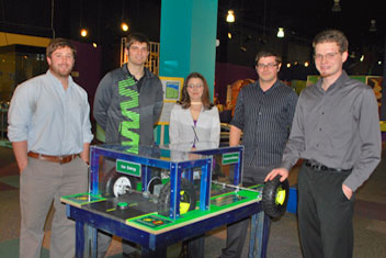 Students in a University of Alabama in Huntsville Mechanical and Aerospace (MAE) capstone design class created a new Sci-Quest exhibit that shows how hybrid cars store and expend energy. From left are Chandler Wicks, Jordan Steelman, Jeannette Zatowski, Dakota Gomez and Paul Fryer.