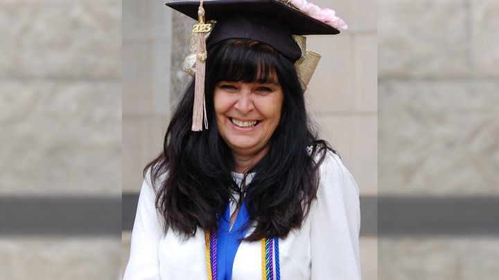 Tina Lyman in graduation cap