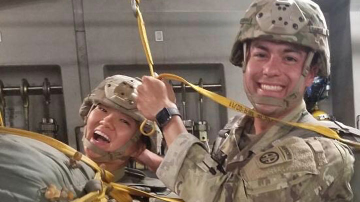 Dimitri Serrano, right, and Juwon Kim began lef jumping out of a plane during a U.S. Army airborne operation