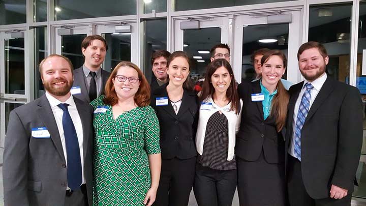 Top row from left: Zach Taylor, Joseph Clerkin, Derek Millard, and Jeffrey Dyas. Bottom from left: Lloyd Walker, Kathy Burris, Hannah Smith, Giulia Palma, Betsy Patterson, and Andrew Gilbert. Not pictured: Maliha Lubna.