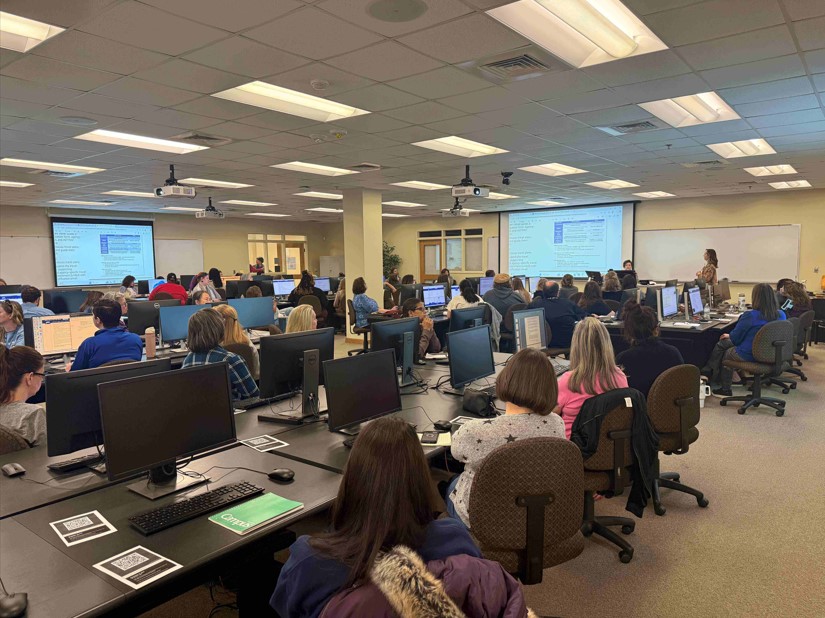 Train the Trainer Travel Liaison Katie Bryant, SMAP, presents to the room