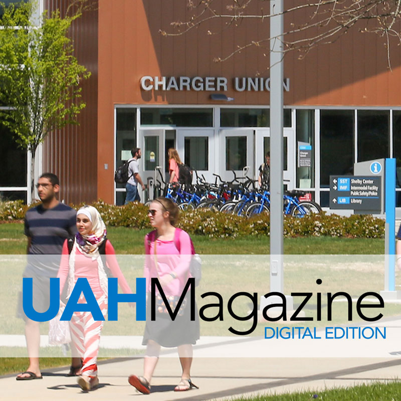 Cover of the U A H Magazine for April of 2024. Students stroll by the entrance to Charger Union on a sunny spring day.