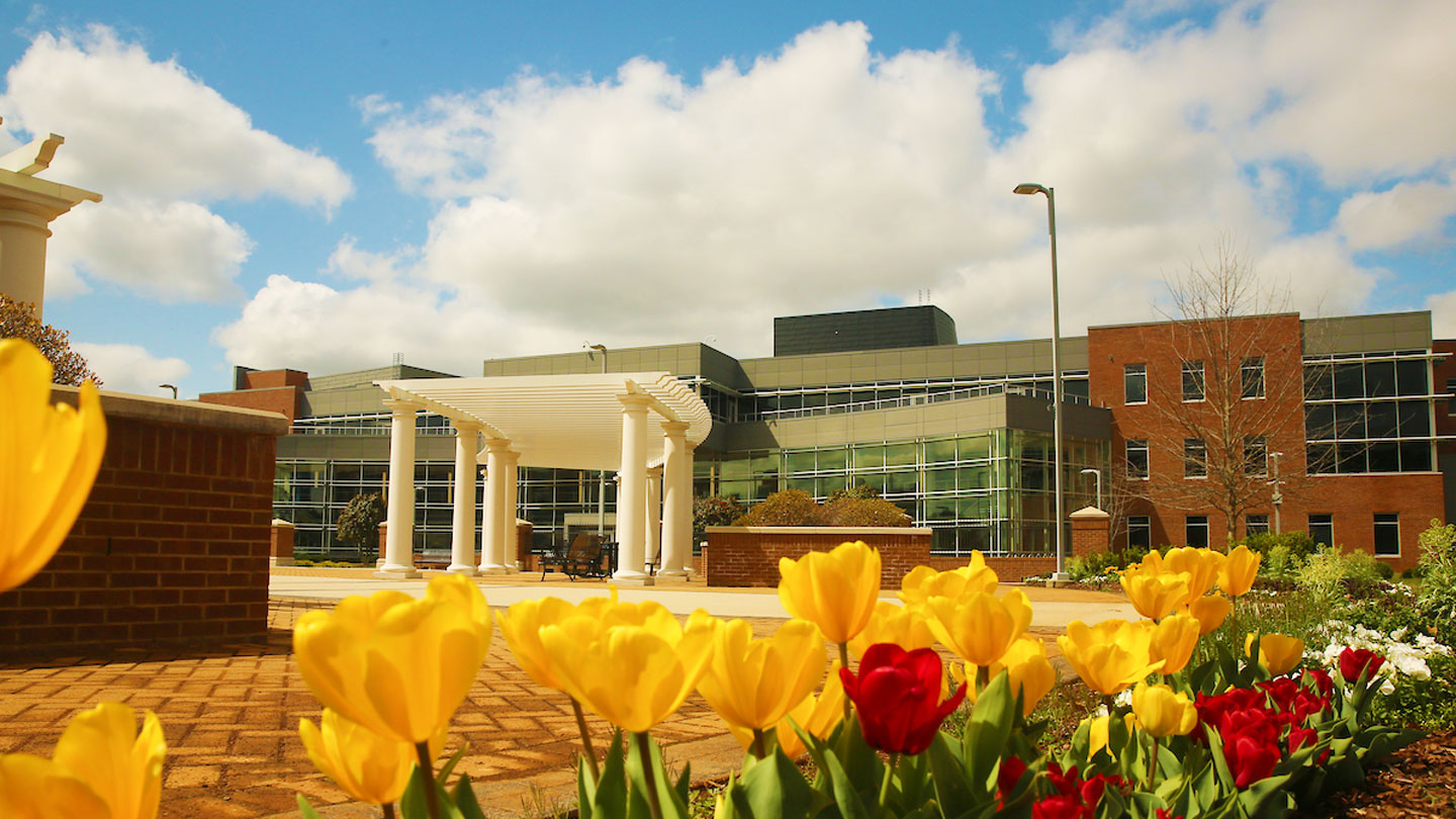 Student Services Building with tulips