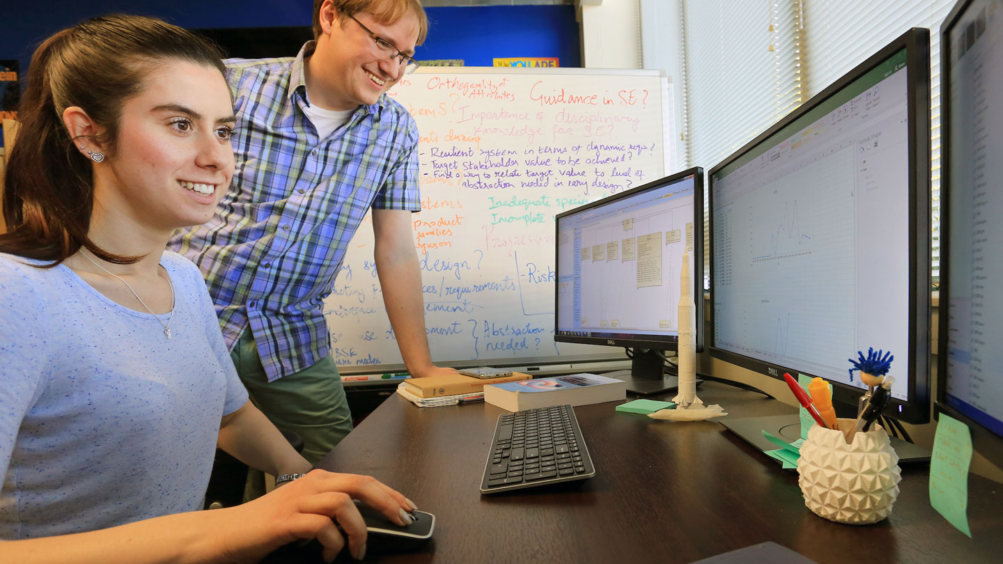data students reading data multiple monitors