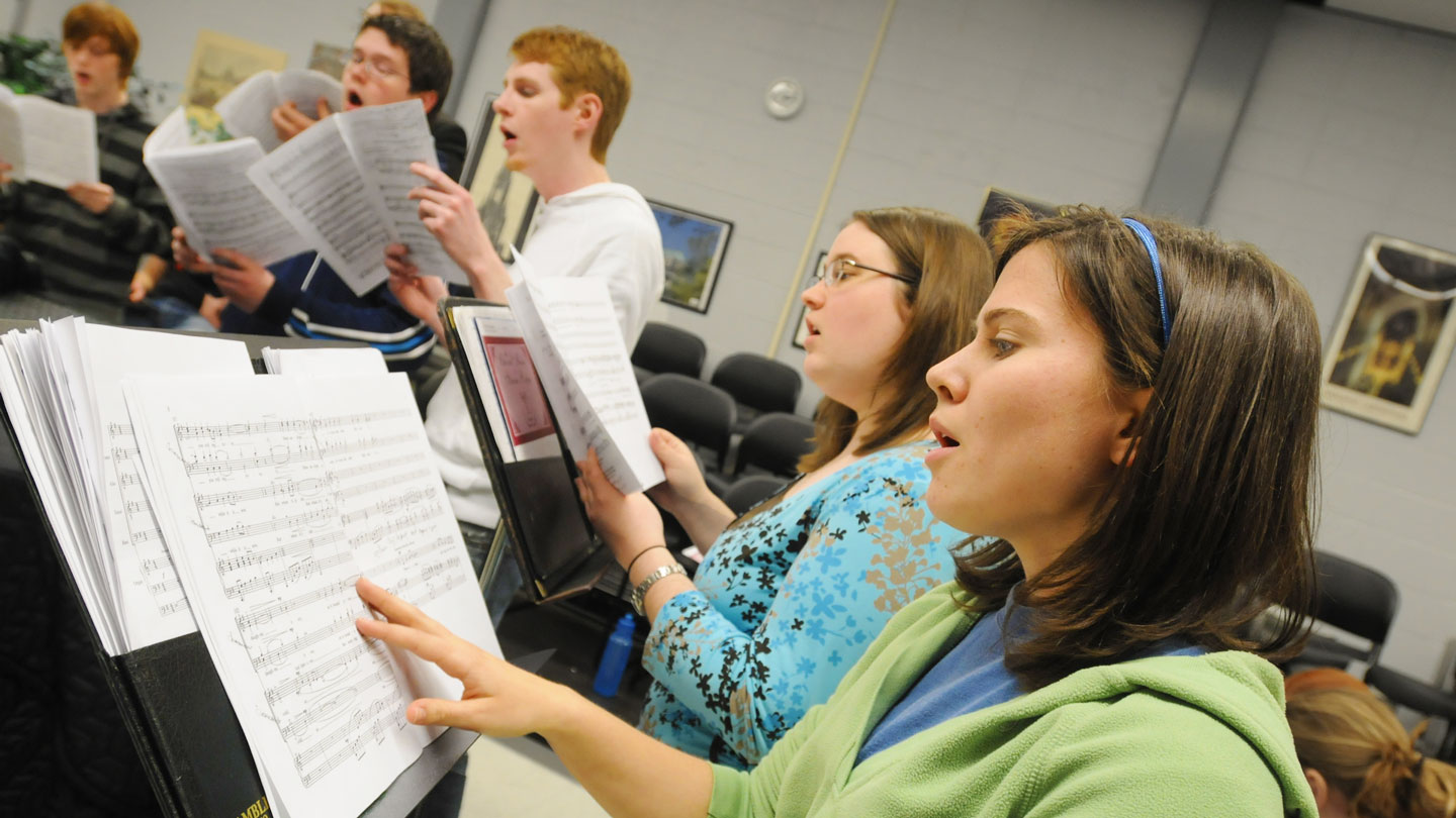 Students in a chorus sing together beautifully