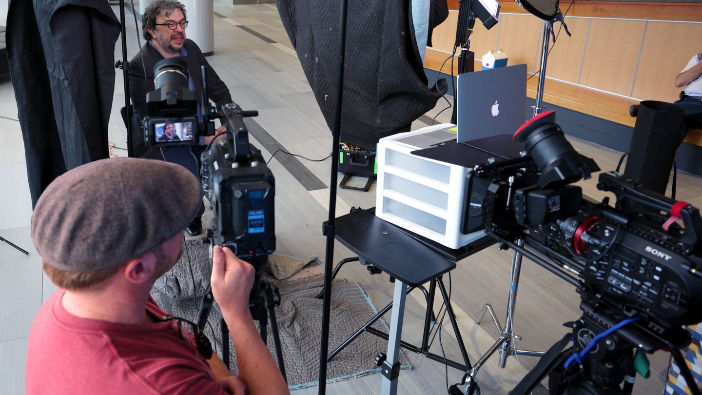 Film students use cameras to capture an interview