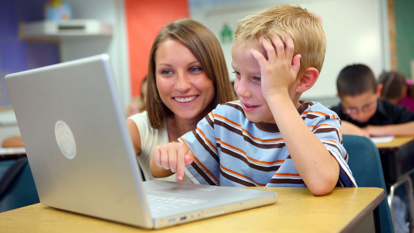 child teacher laptop