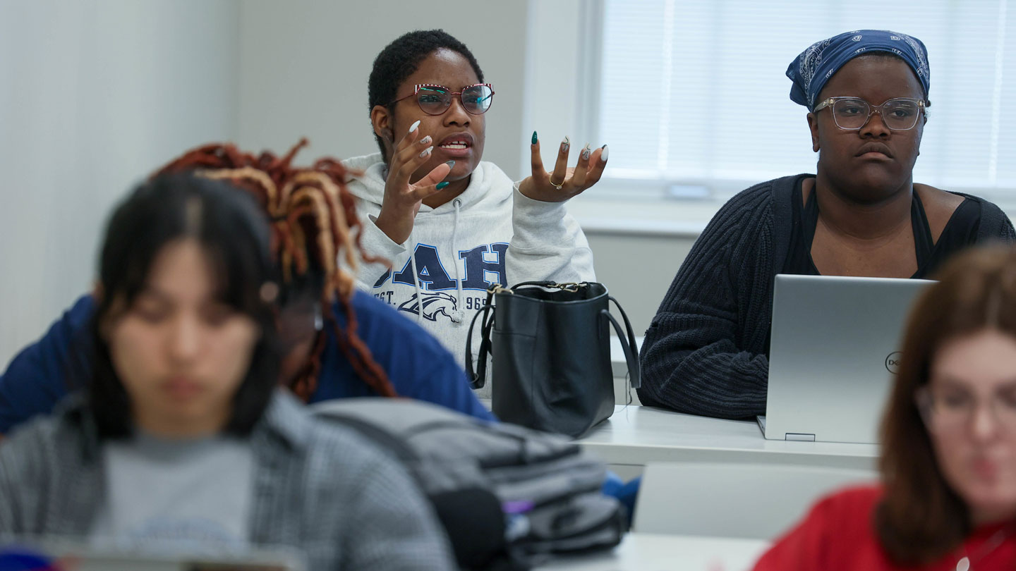 A student attempts to express themselves in class