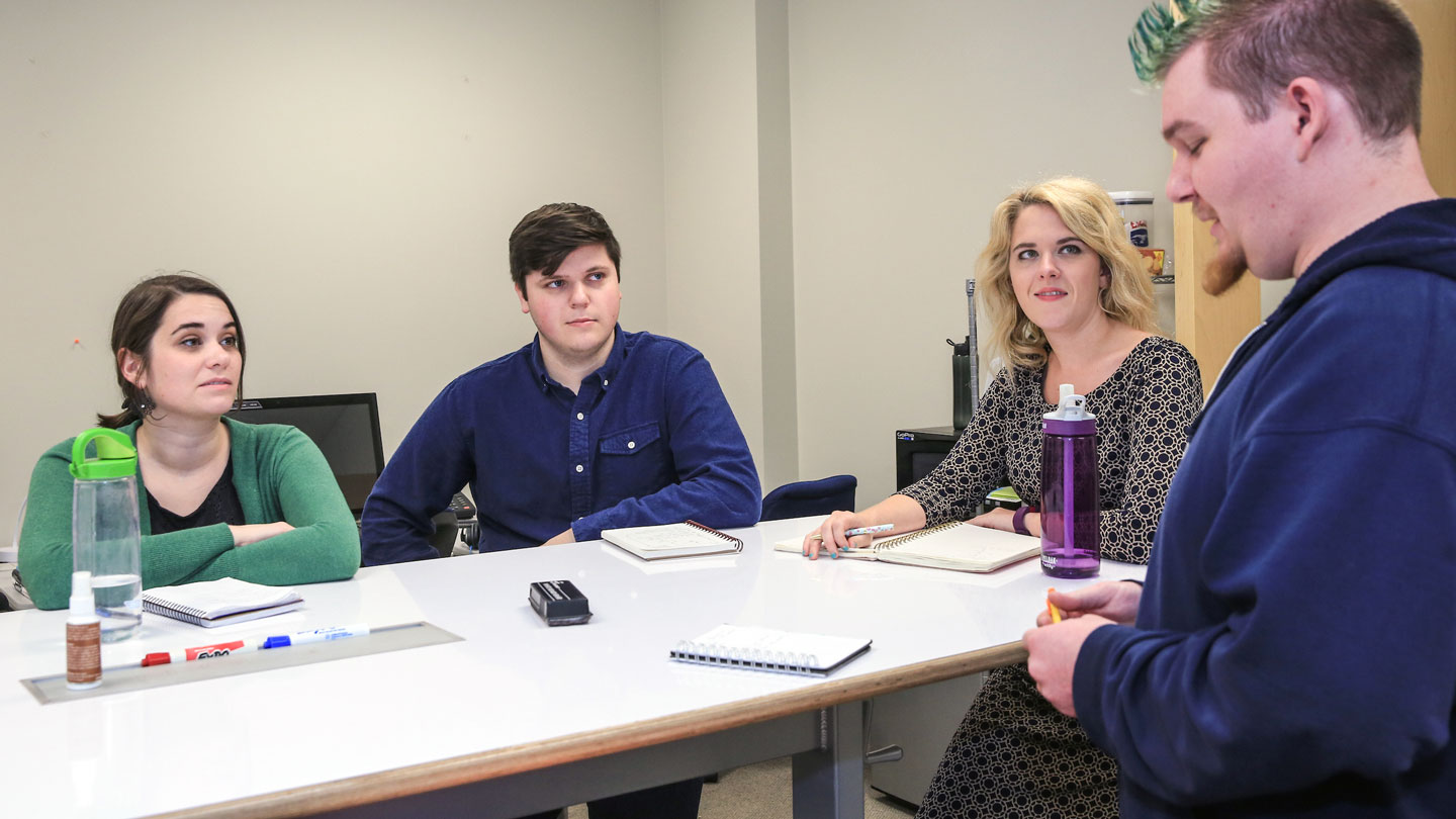 Students have a small group discussion