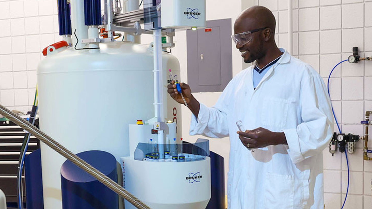 A student uses scientific equipment to collect data