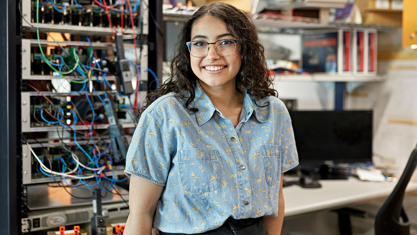 woman at computer servers