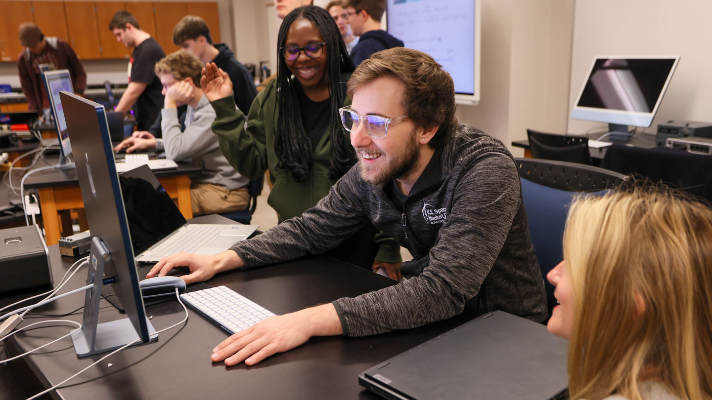 Student enjoy each others company during a group assignment