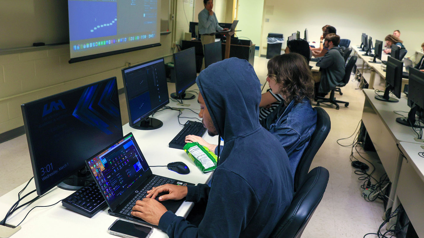 Students work in a computer lab