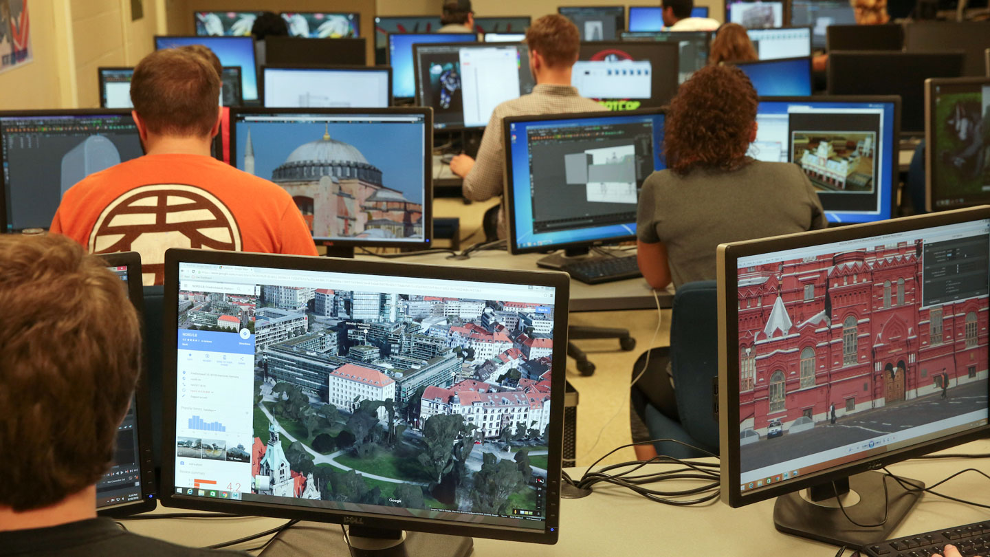 Students observe city scapes on their computers