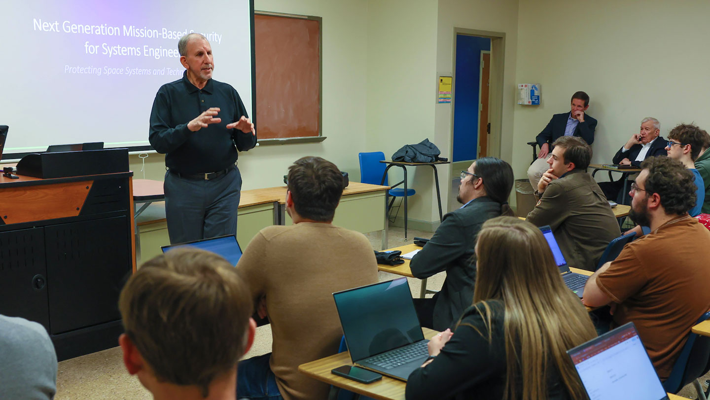 NIST fellow Ron Ross lectures students on engineering and mission security