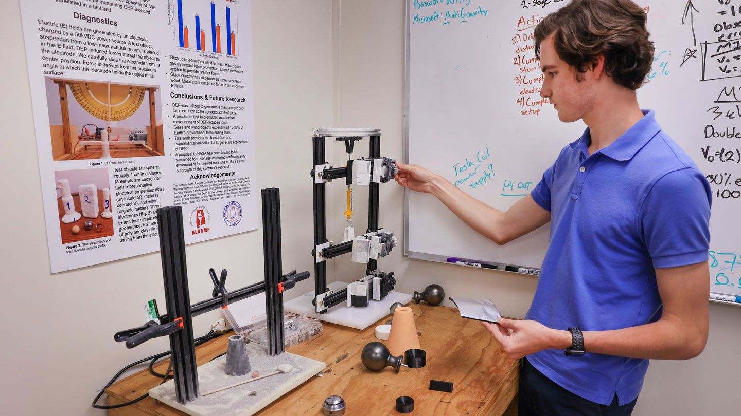 A student conducts a curved object experiment