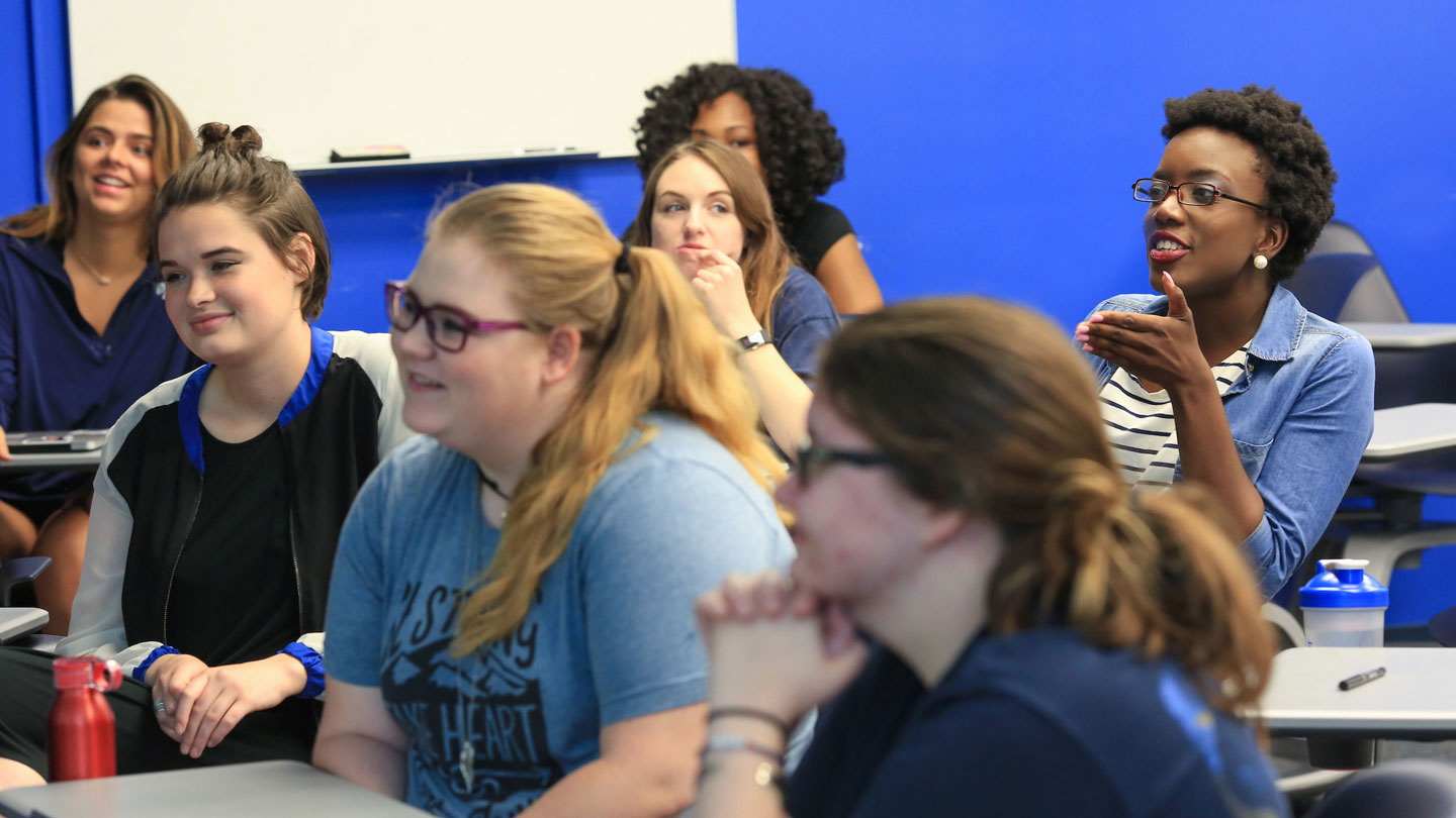 Female students have a deep discussion together