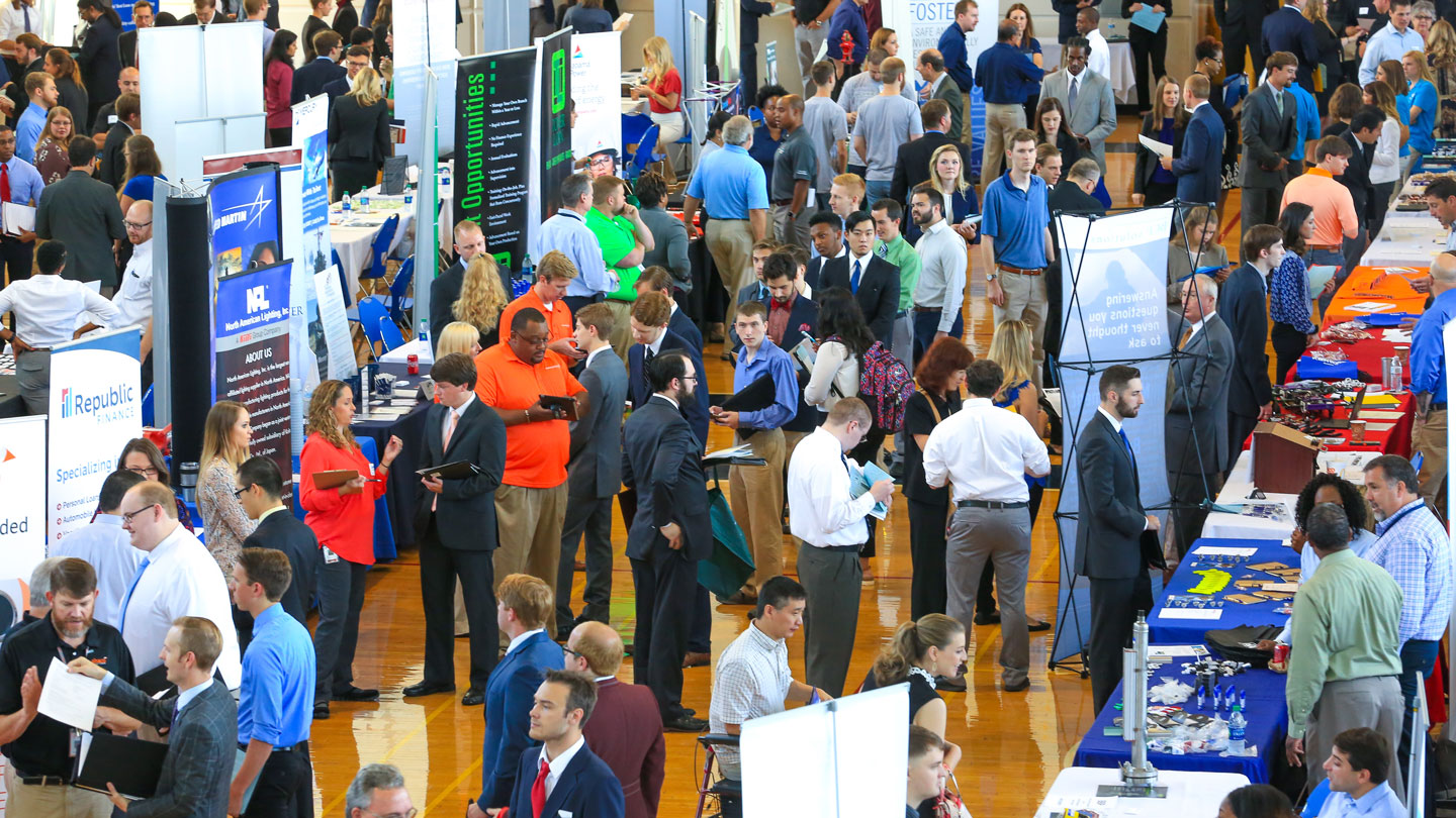 Students at Career Fair browsing employer booths