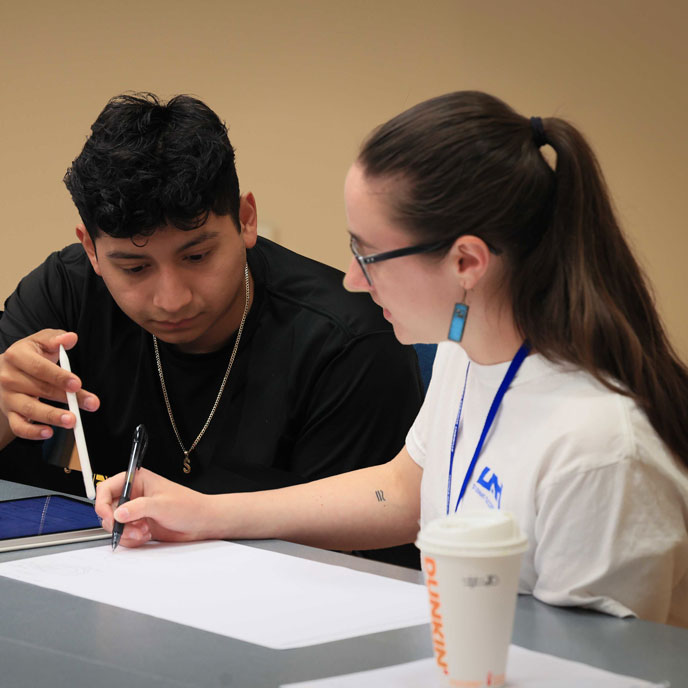 A U A H student and turor work together at the Fall 2023 tutoring blitz