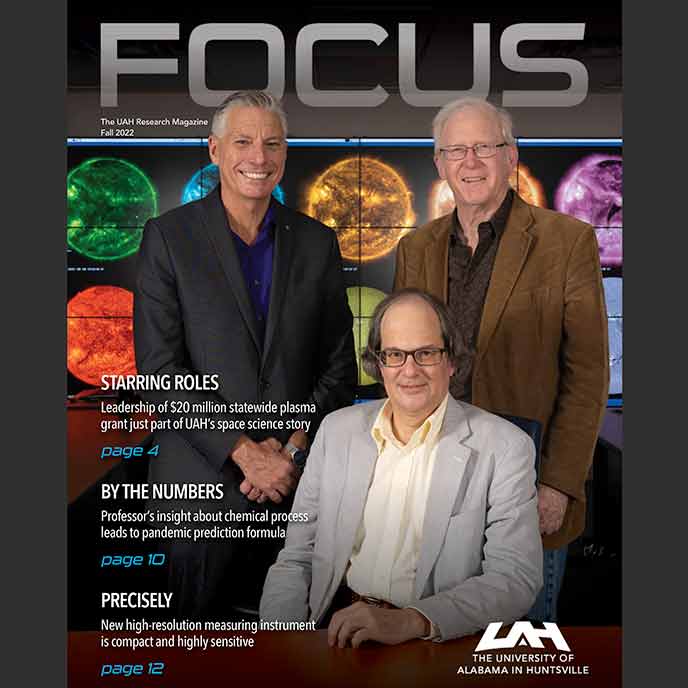 front cover of FOCUS Fall 2022 magazine depicting 3 scientists standing in front of an image of multiple detailed stars