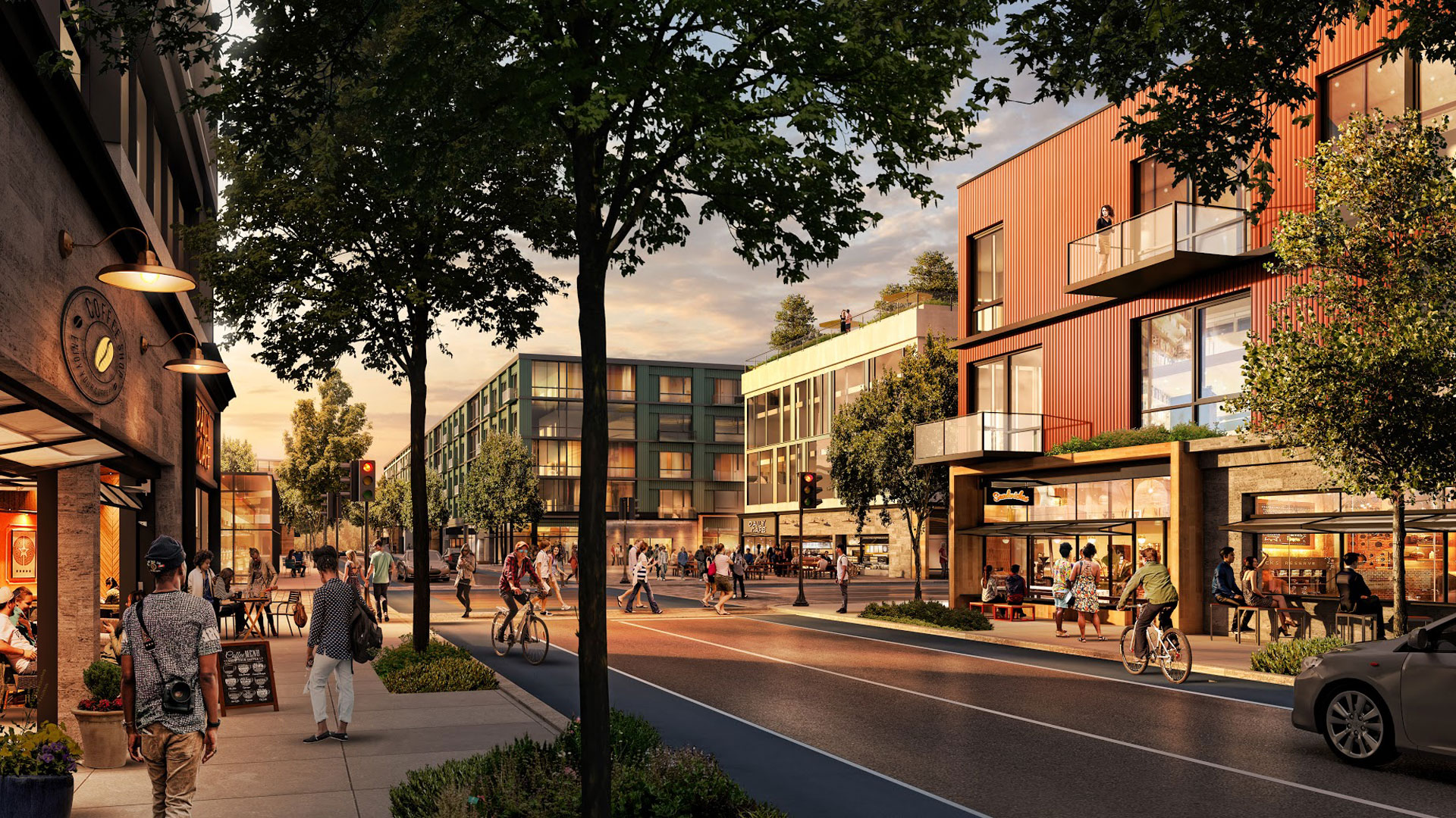 An artist's illustration of a student community with apartments and shops along a campus street.