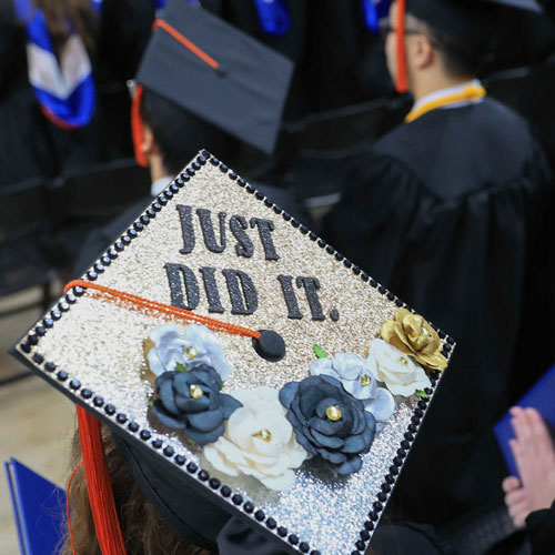 a graduation cap that contains the message Just did it.