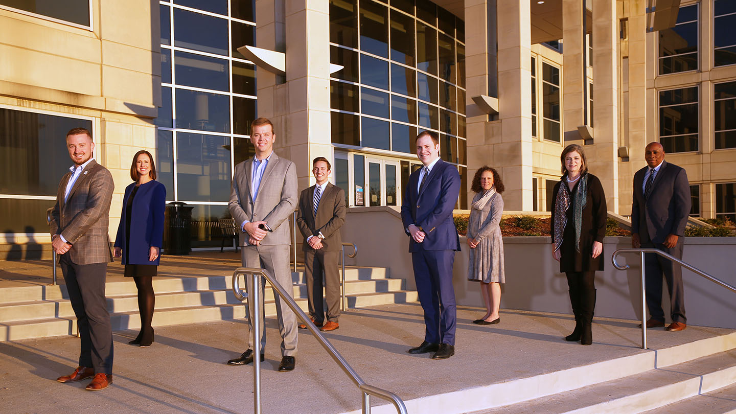 Alumni Board of Directors standing in a group photo.