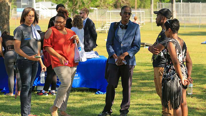 People meeting up in a park.