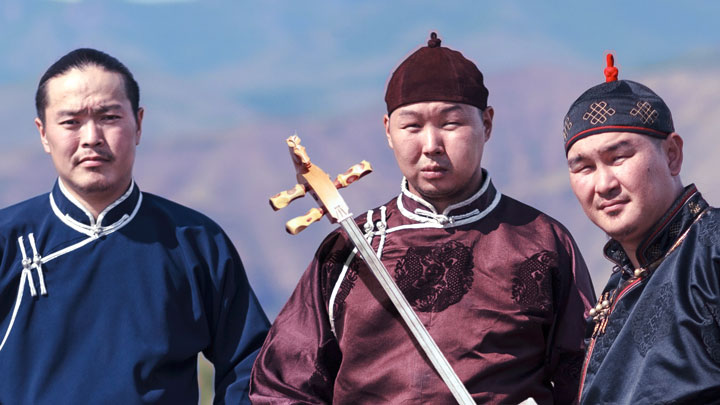 alash tuva throat singing group dressed in traditional mongolian outfits