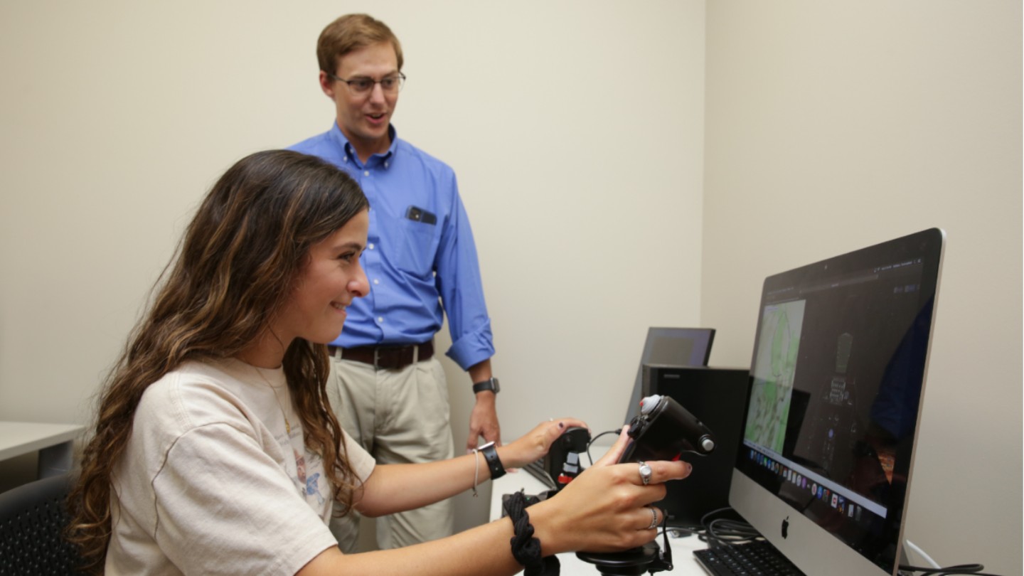 uah psy professor in lab with student