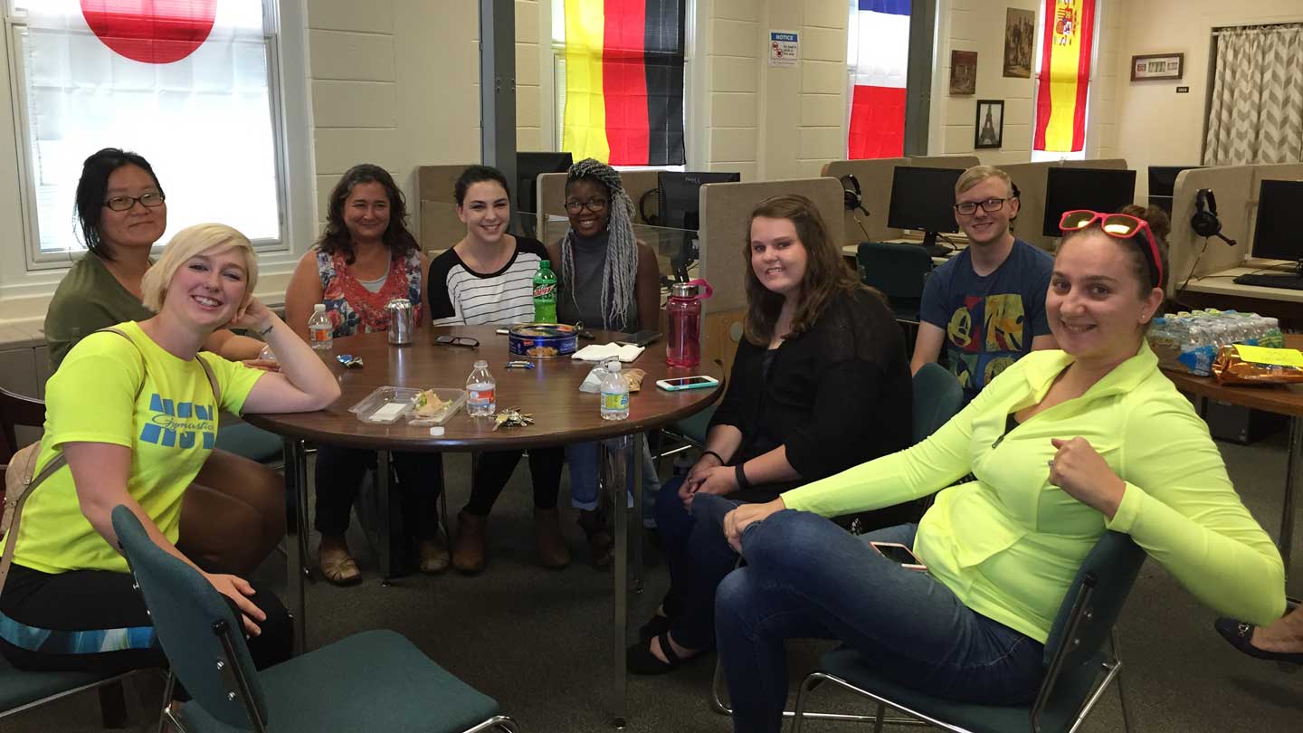 Group of students sitting around a table