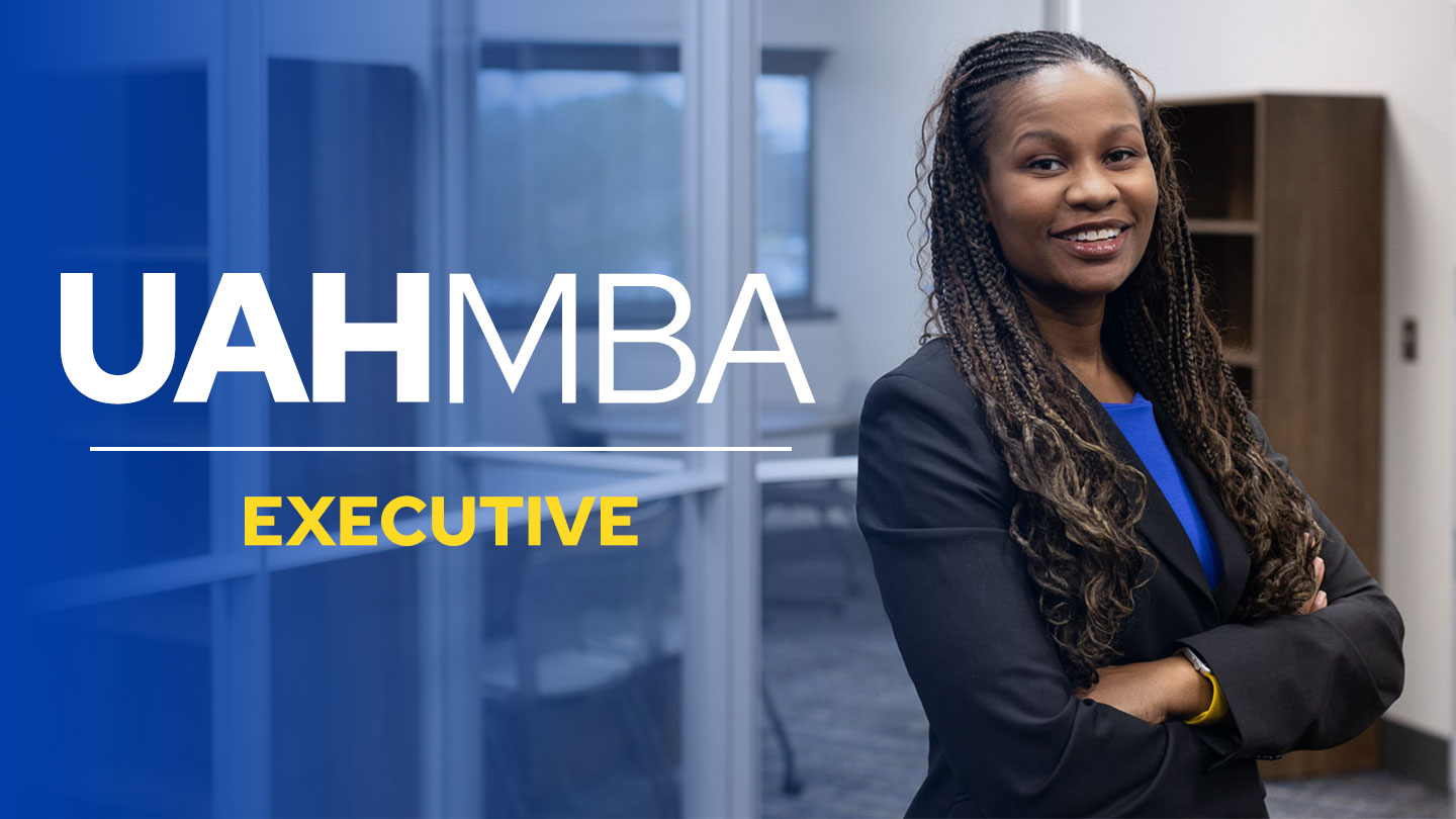 A smiling U A H executive M B A student in business attire. Text reads U A H Executive M B A