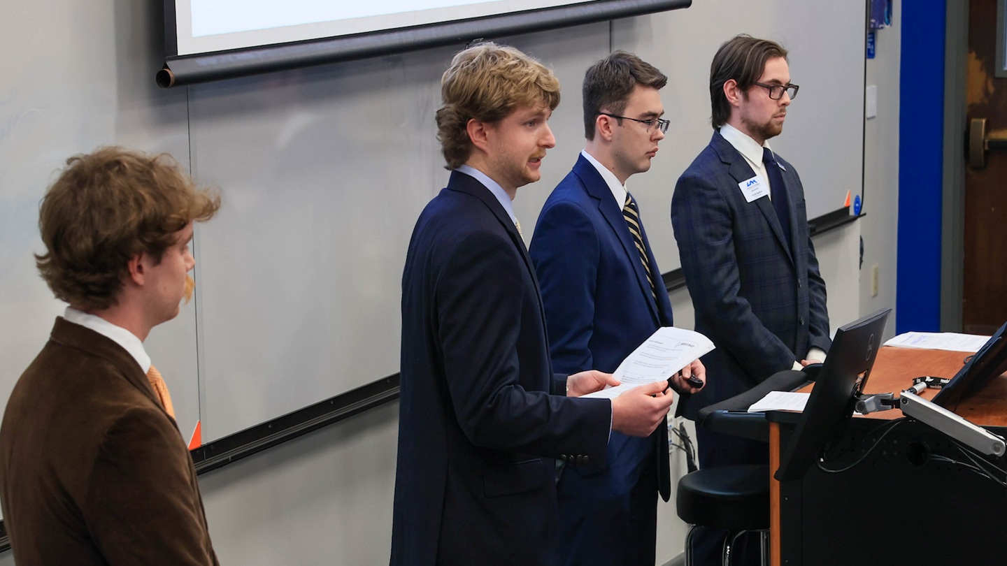 students talking at table under 1024kb