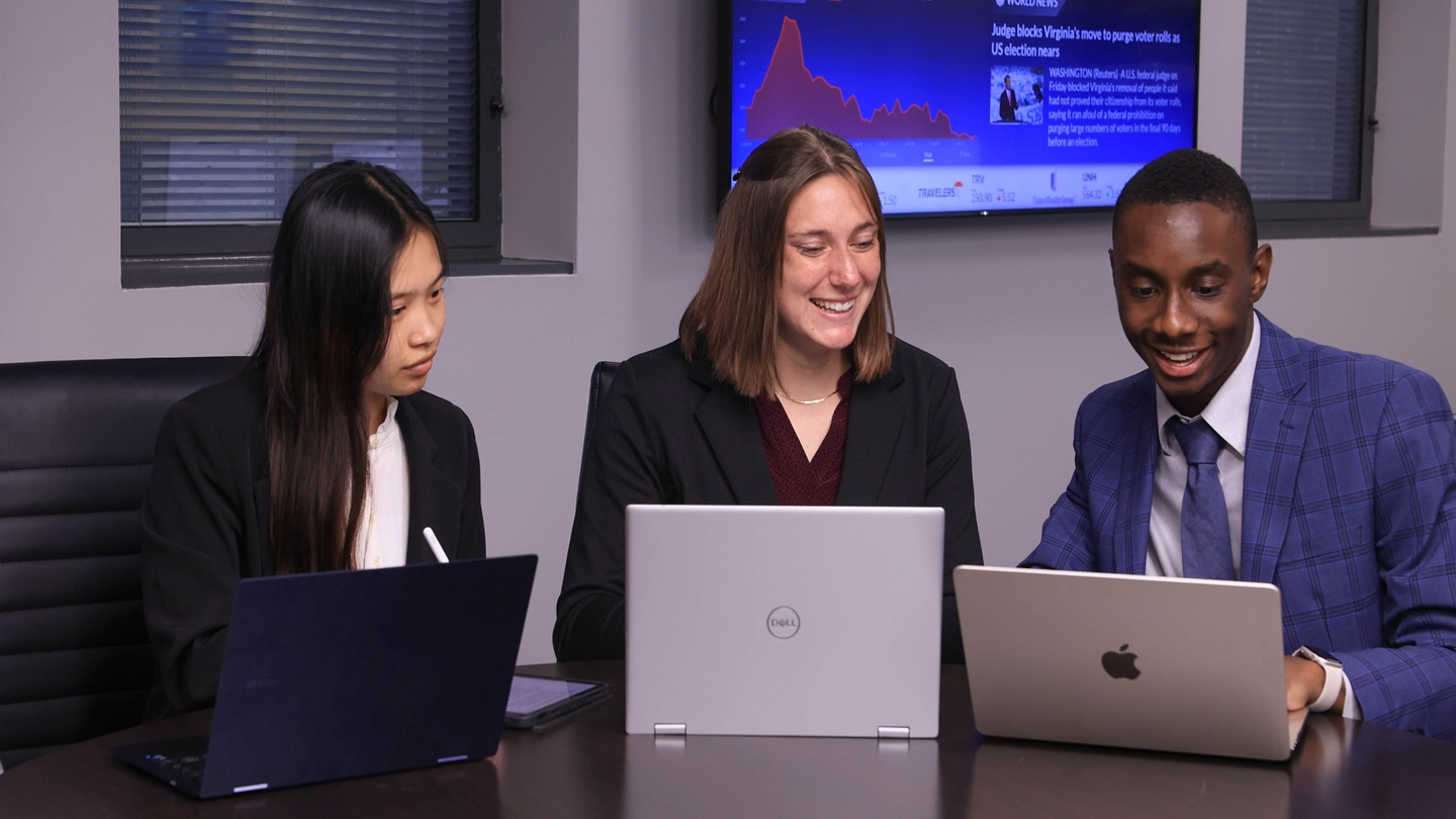 Students giving a presentation in a classroom