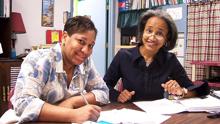 teachers with papers