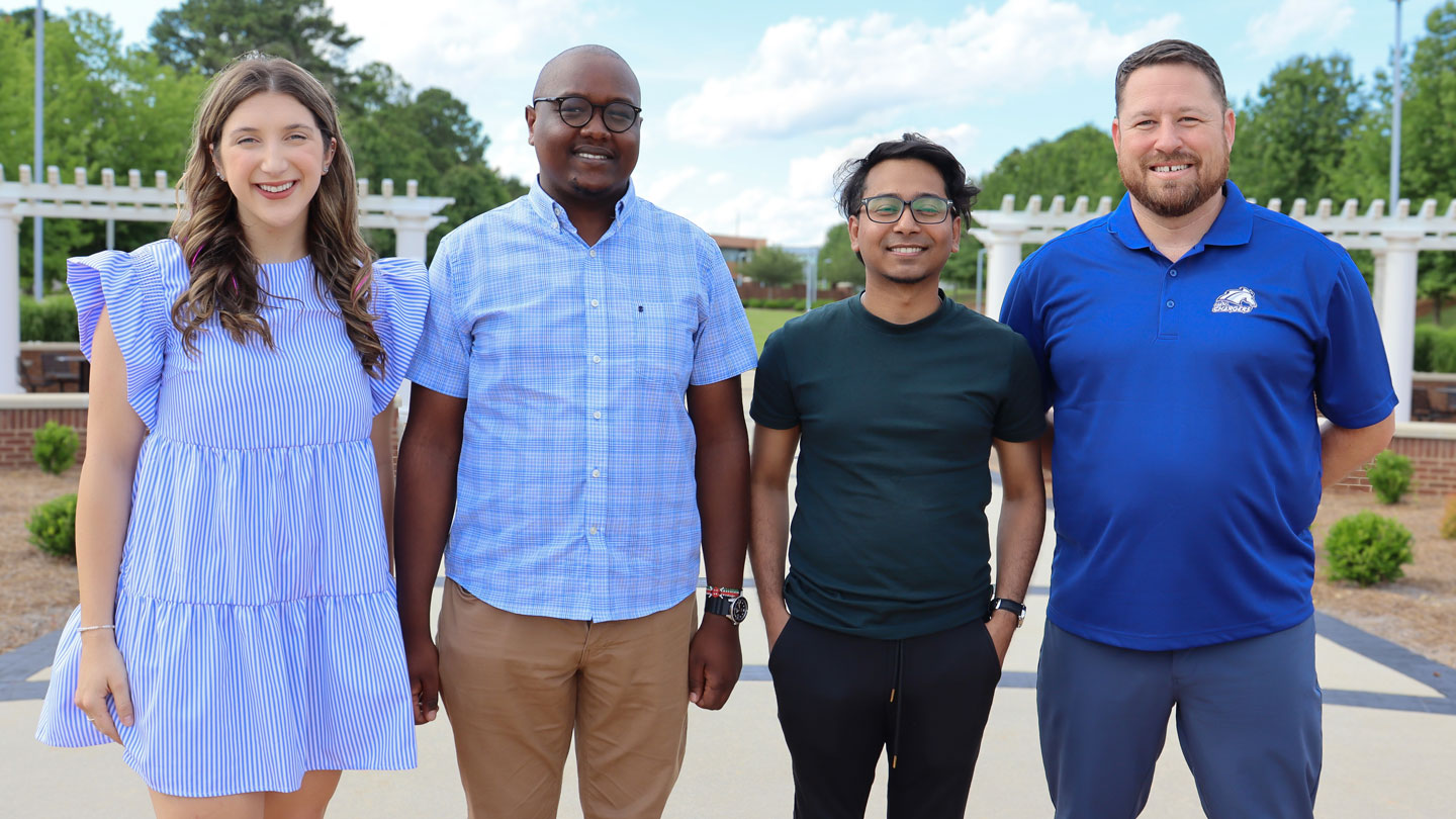 A picture of Gracie Davidson, Gideon Kungu, Mohammad Raihan Uddin, and Justin Brown 