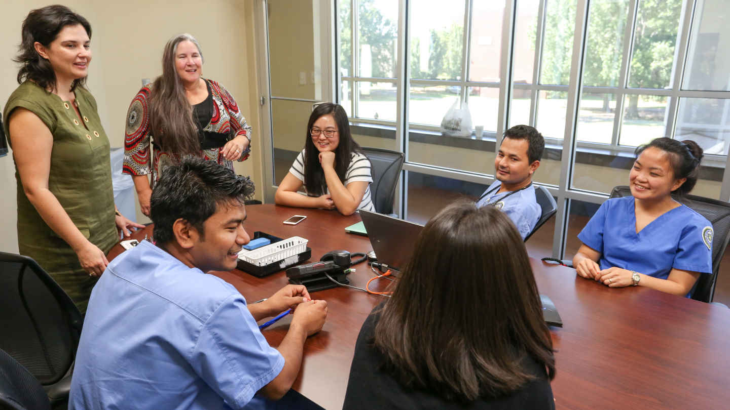 seven people attend a meeting