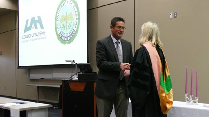 Eddie Damron accepting the Research Horizons Undergraduate College of Nursing Award.