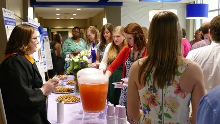 Rebecca Davis hosting the refreshment table.