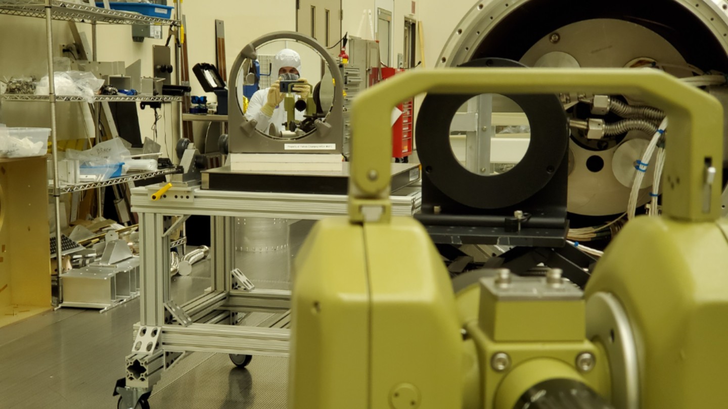 Dr. Patrick Champey taking a “selfie” while checking the alignment of the MaGIXS instrument.