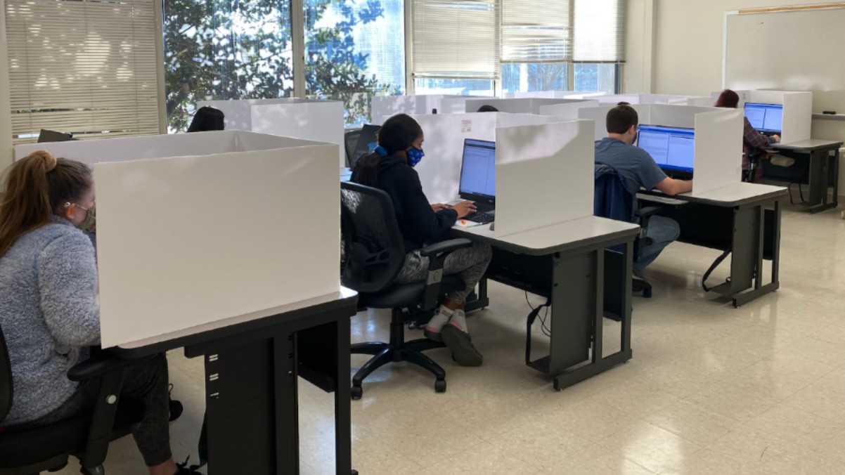 students sit for an exam