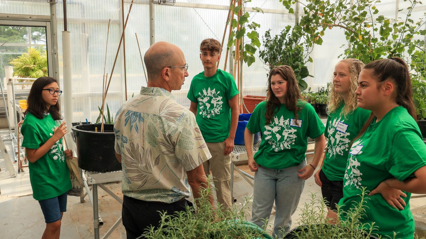 Dr. Wolf and Biological Sciences Students in the SST Greenhouse 