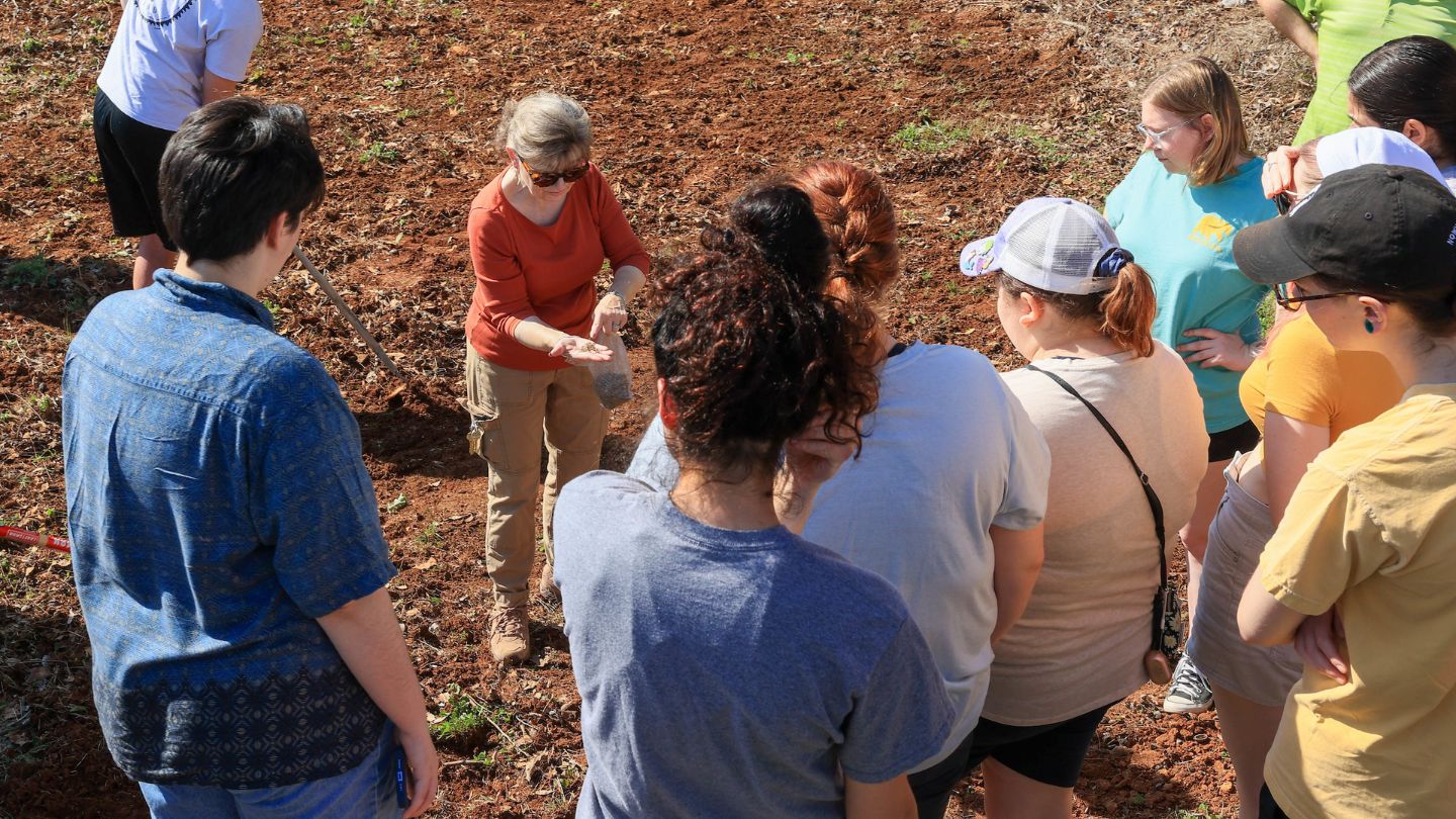 Dr. Lawana Adcock with her students at the People, Plants and the Environment class